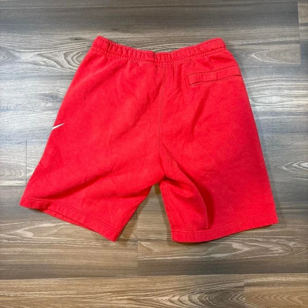 Nike red cotton & polyester shorts with white swoosh